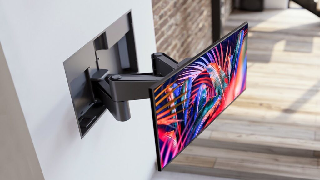 Wall-mounted flat screen TV on an adjustable arm bracket installation.